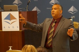 Rory Bahadur standing and gesturing