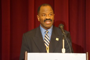 Blake Morant stands behind a microphone to deliver his 2015 Presidential Reprot
