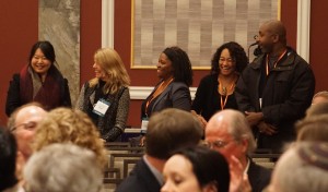 Five members of the University of California, Irvine School of Law cheer their school into AALS membership