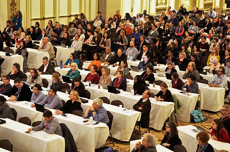 Attendees enjoy the keynote address on April 29.